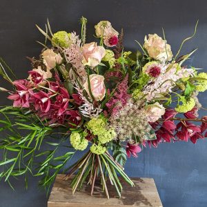 Pink rose and orchid bouquet